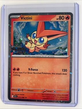 Pokemon Victini Orange and Blue Holographic Card